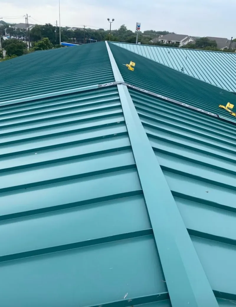 Green commercial metal roof ridge and valley for Metal Roof Repair in Steele Creek