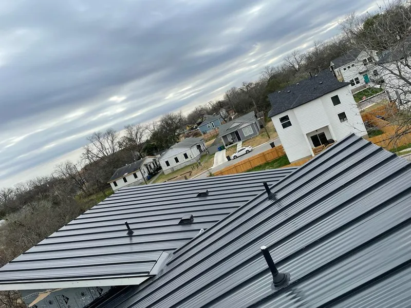 Standing seam metal roof panels with vents for Skylight Repair in Steele Creek